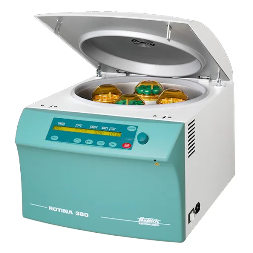 Centrifuga da laboratorio da banco con il coperchio aperto e le provette colorate nel rotore