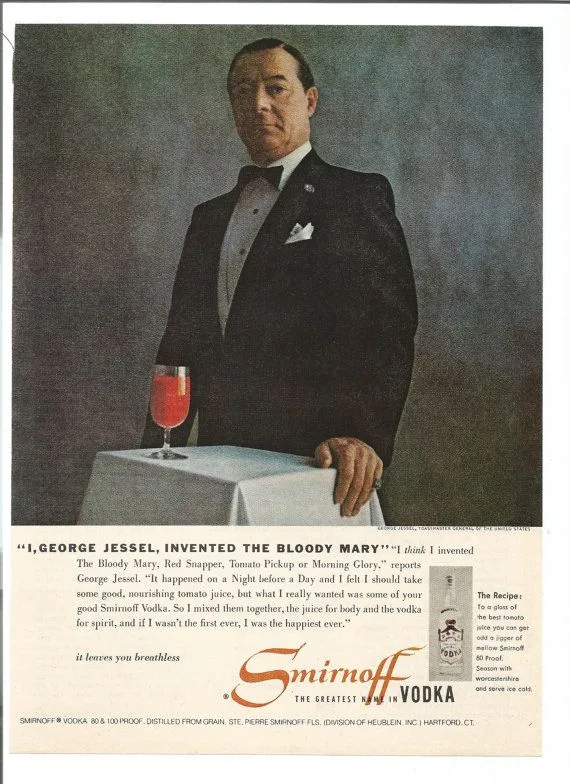 Pubblicità Smirnoff del 1956: George Jessel in smoking accanto a un Bloody Mary, con il titolo I, George Jessel, invented the Bloody Mary